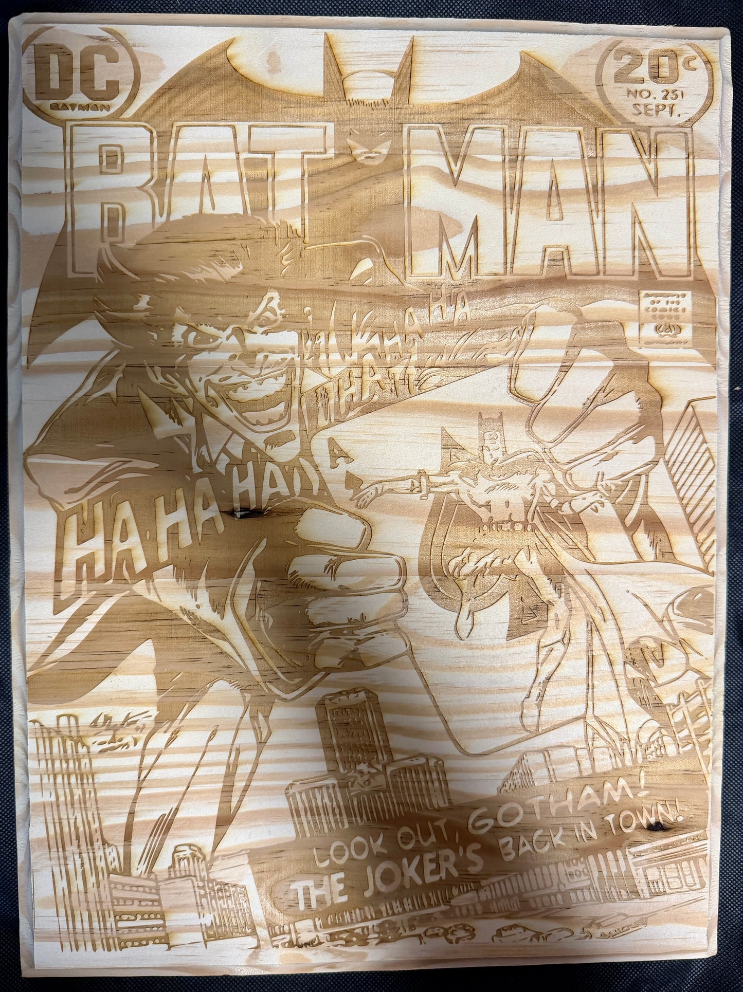 Wooden model of a comic book cover featuring Batman, with 'DC' and 'Batman' branding.