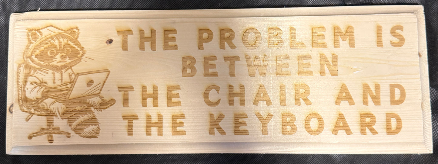 The Problem Is Between the Chair and Keyboard Plaque